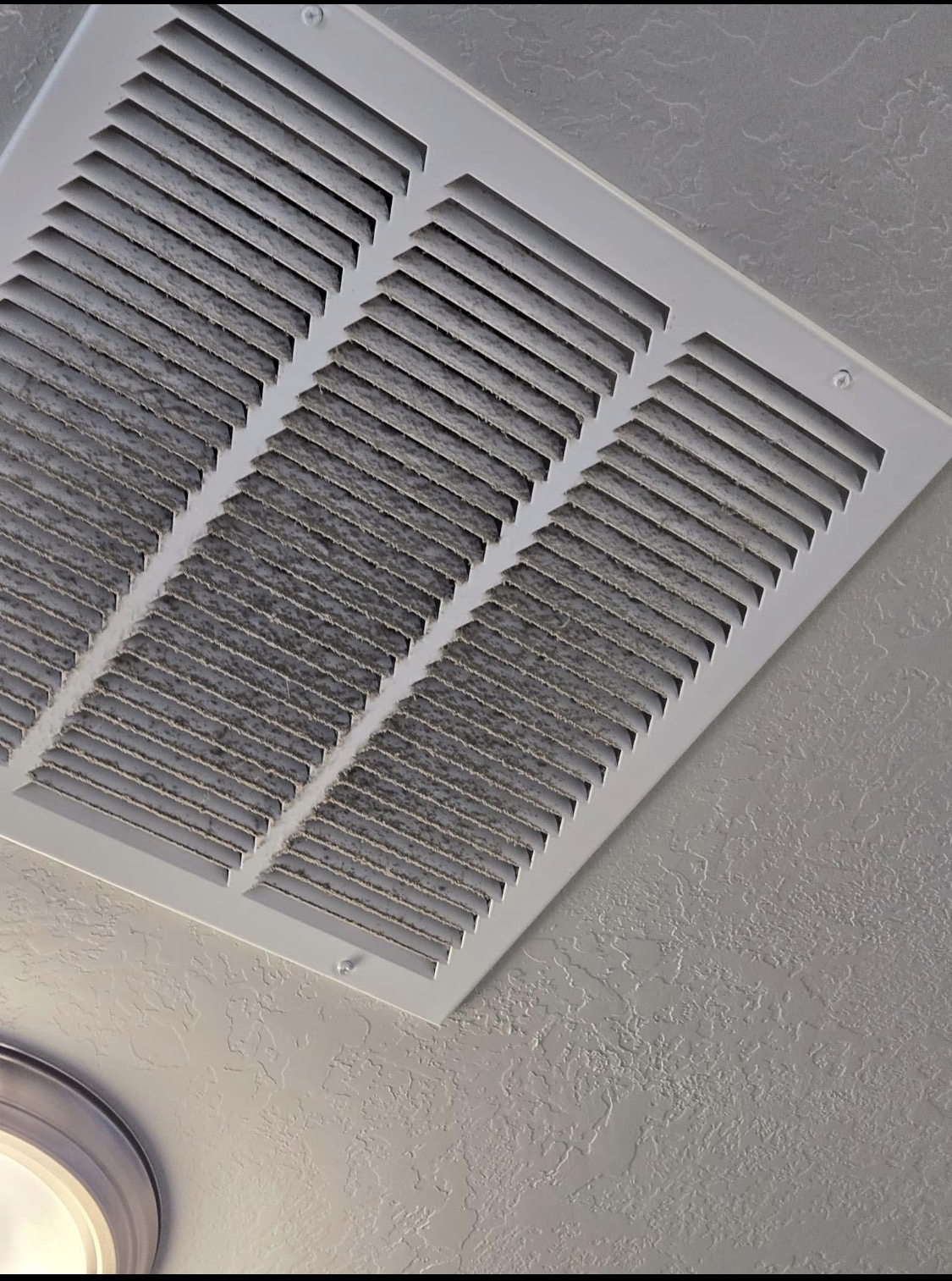 Before cleaning ceiling vent